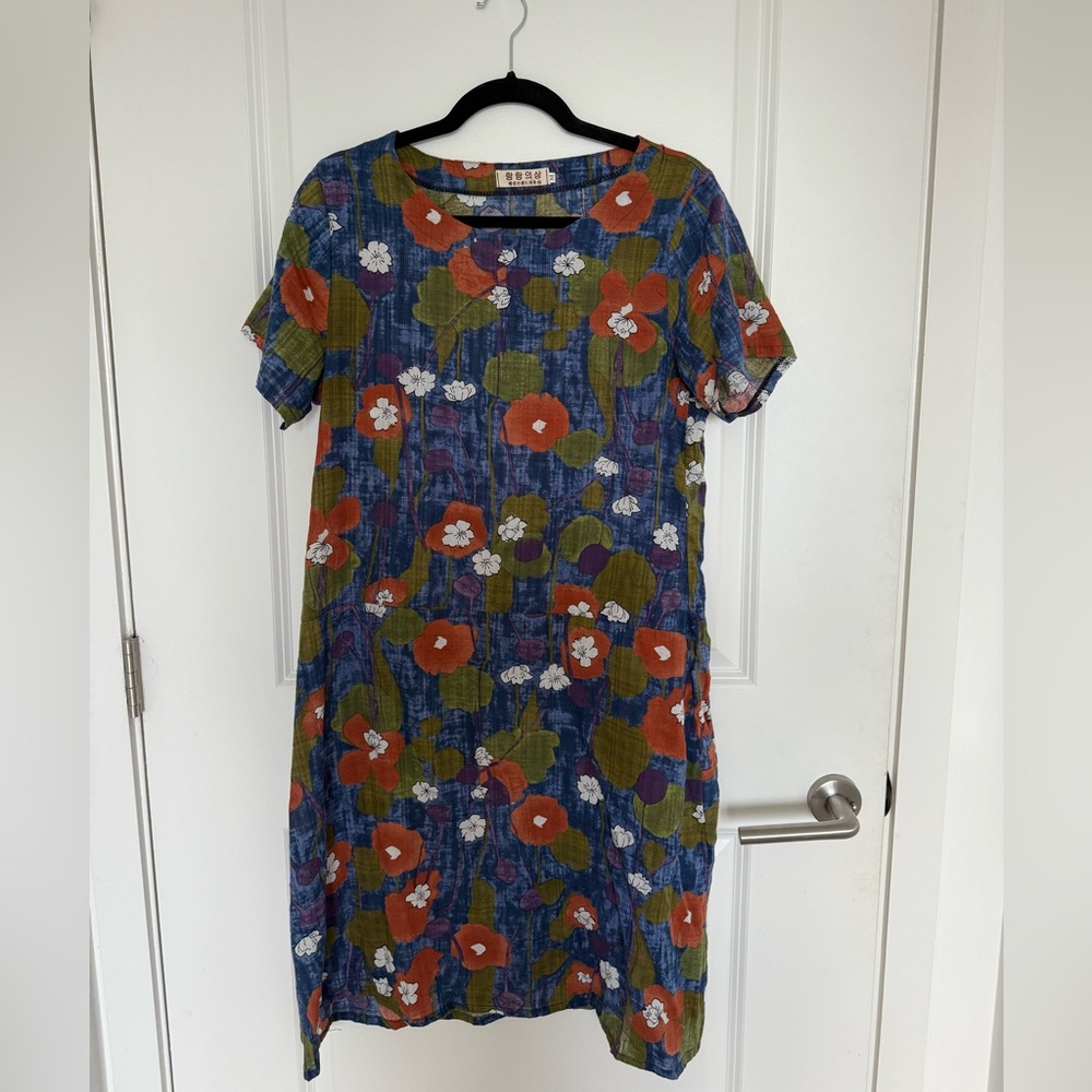 Blue midi dress with floral patterns
